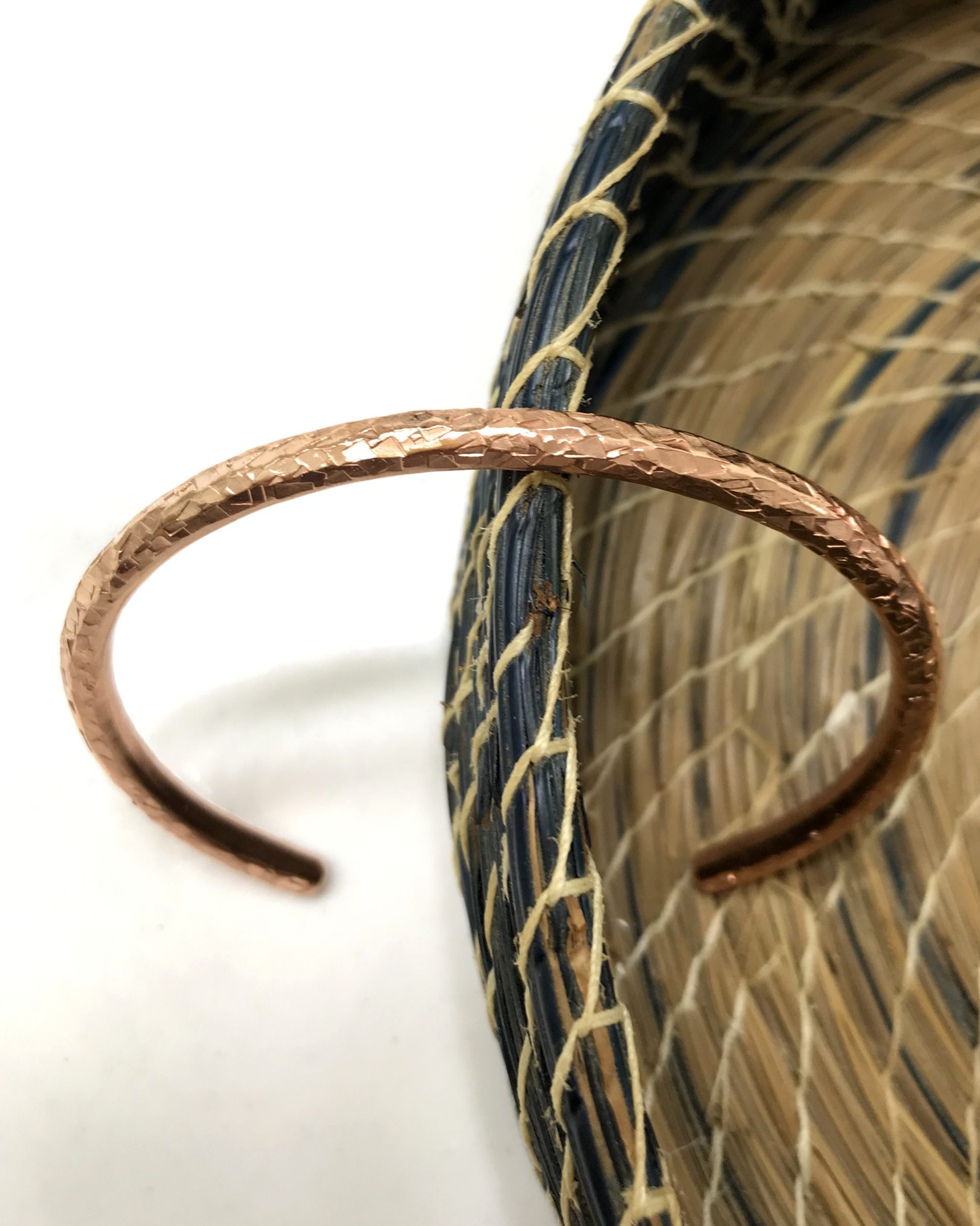 top view of textured handmade copper bracelet