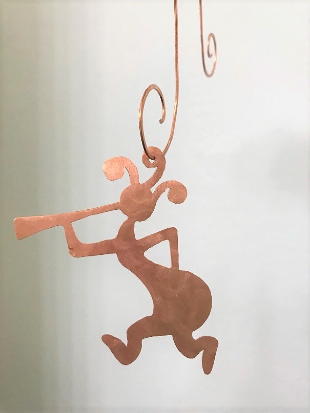 Kokopelli Copper Ornament with Hanger. This image shows the ornament hanging.